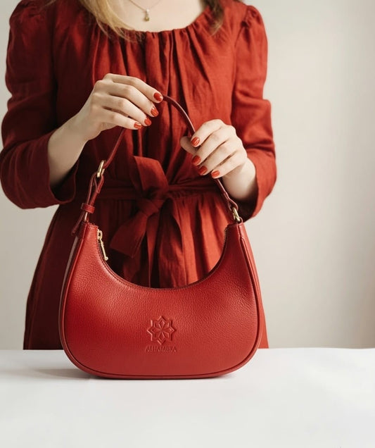 The Crescent Sling — Handcrafted Sculptural Leather